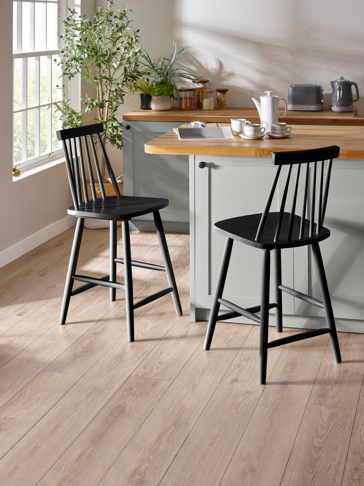 Alassio black spindle back bar stool by Julian Bowen