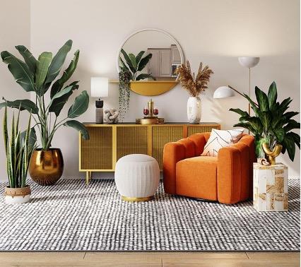 Stylish living room featuring an orange armchair, indoor plants, a patterned rug, modern sideboard, and decorative lighting in a warm, contemporary interior.