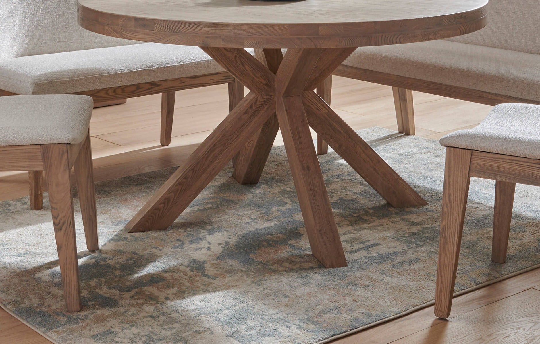 Falun Round Dining Table – Smoked Oak with Solid Oak Legs